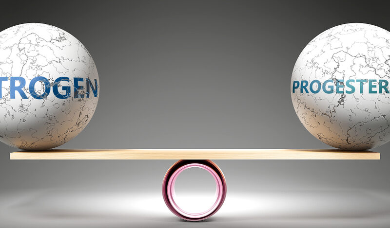 Estrogen,and,progesterone,in,balance, ,pictured,as,balanced,balls
